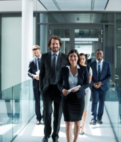 businesswoman-walking-with-colleagues-2025-04-05-02-36-53-utc
