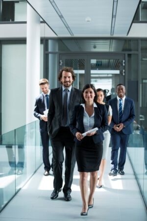 businesswoman-walking-with-colleagues-2025-04-05-02-36-53-utc